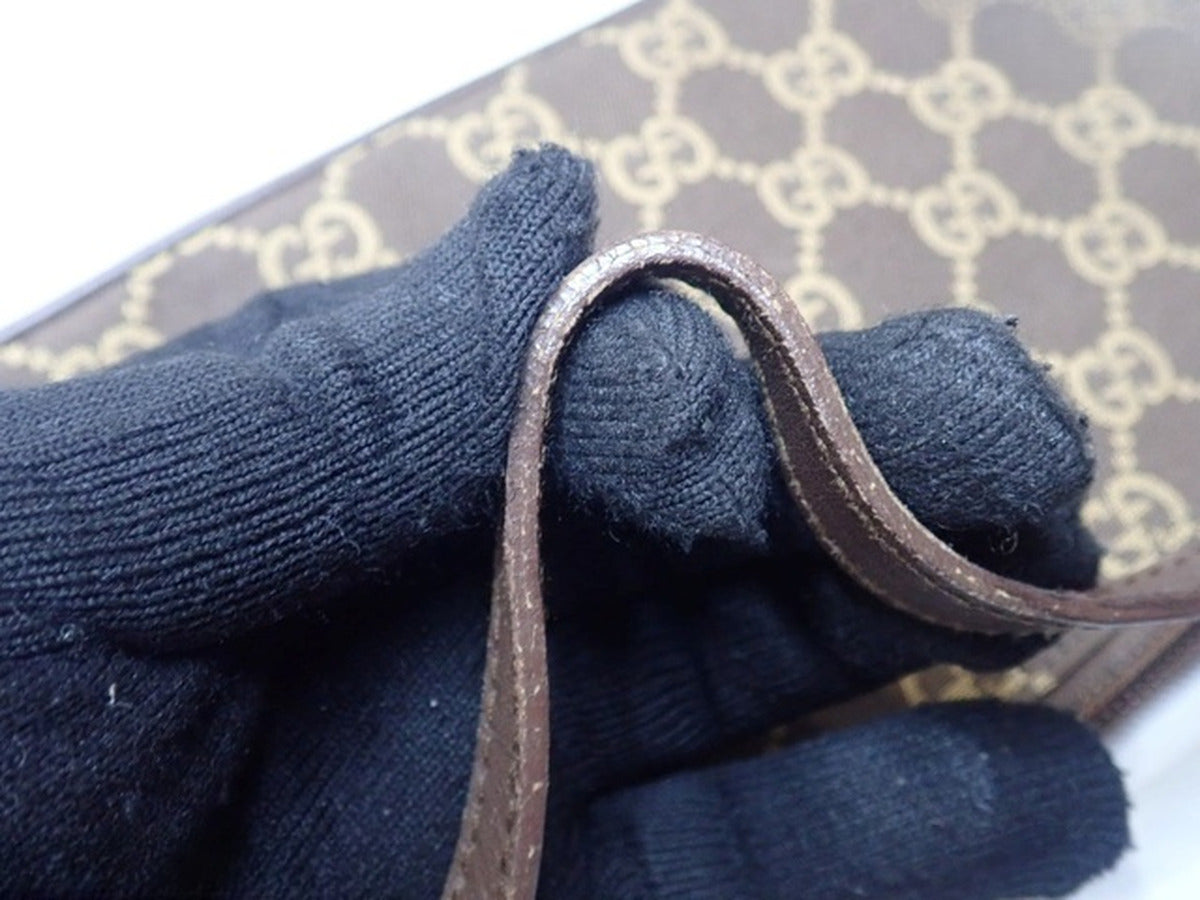 Gucci – Pochette Boat en toile GG marron