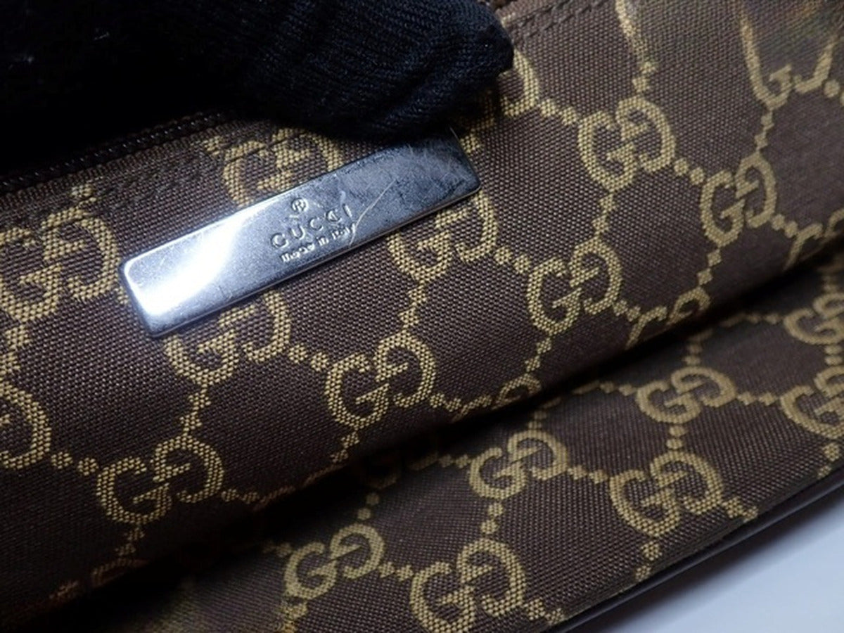 Gucci – Pochette Boat en toile GG marron