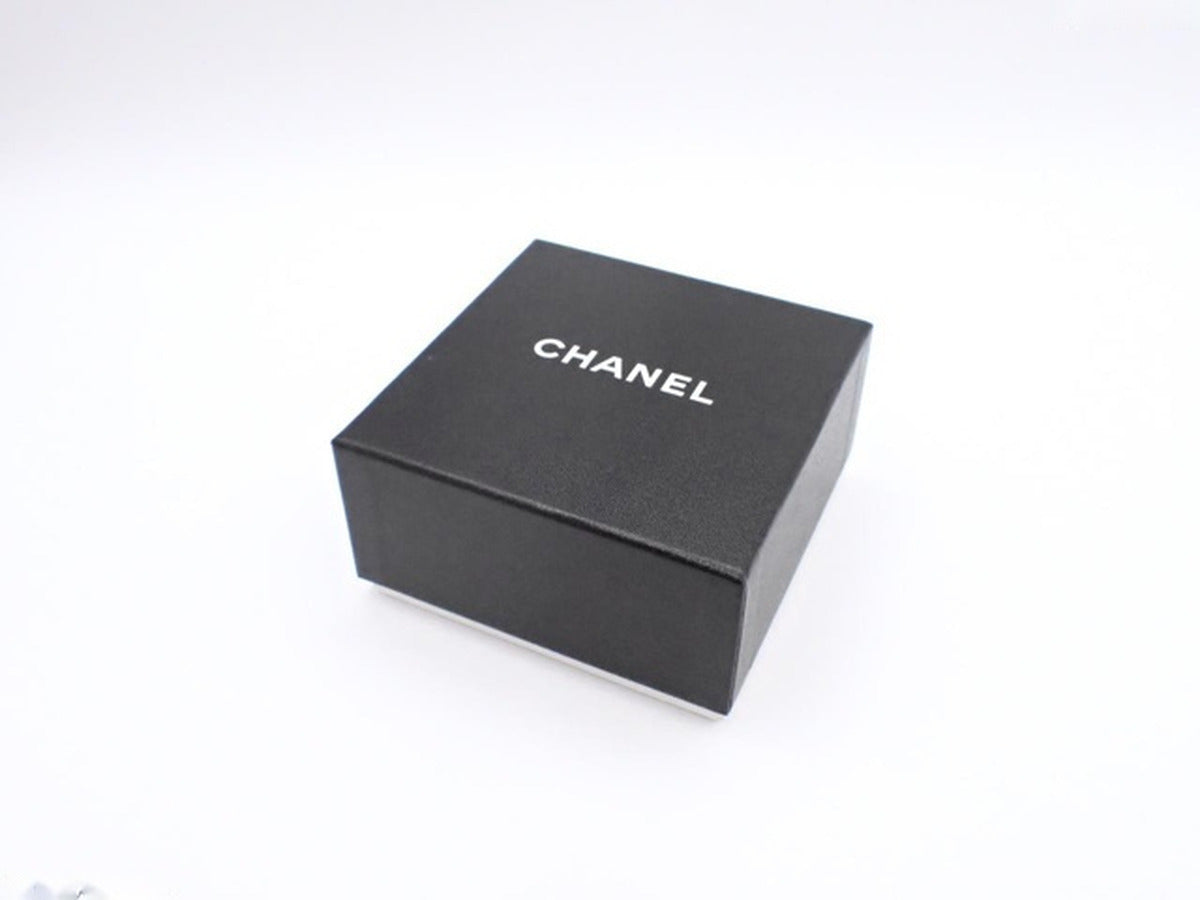Chanel - Broche Camélia vintage en cuir