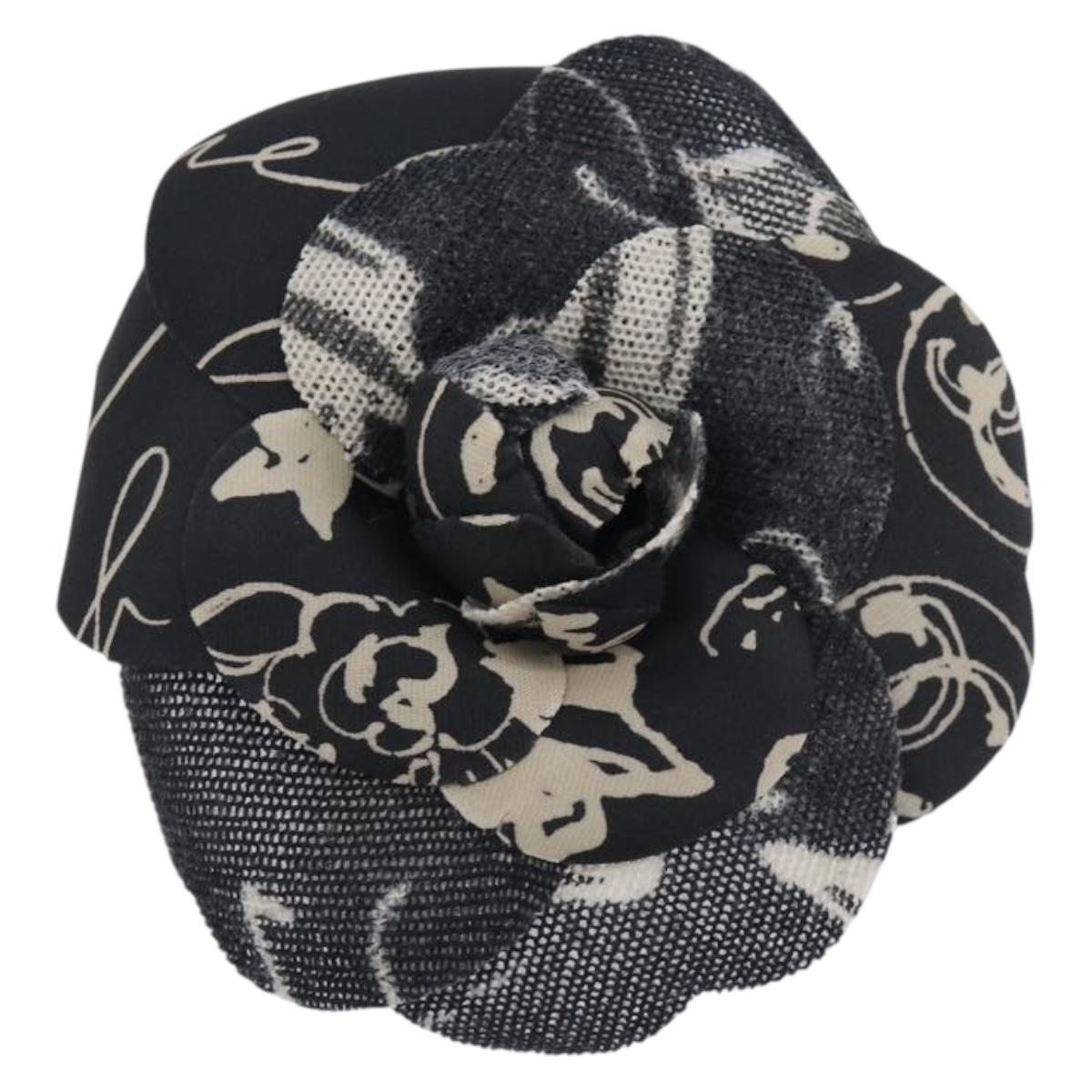 Chanel - Broche Camélia en tissu imprimé