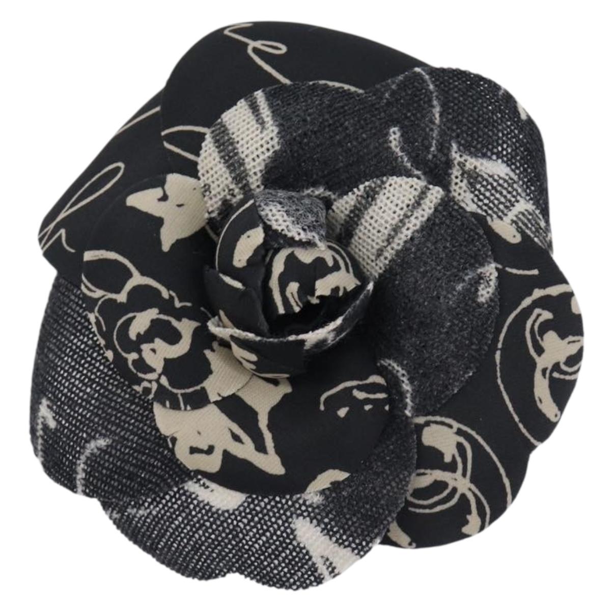 Chanel - Broche Camélia en tissu imprimé