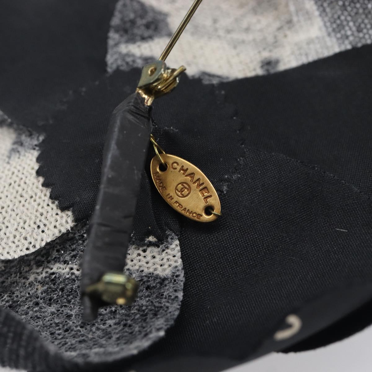 Chanel - Broche Camélia en tissu imprimé