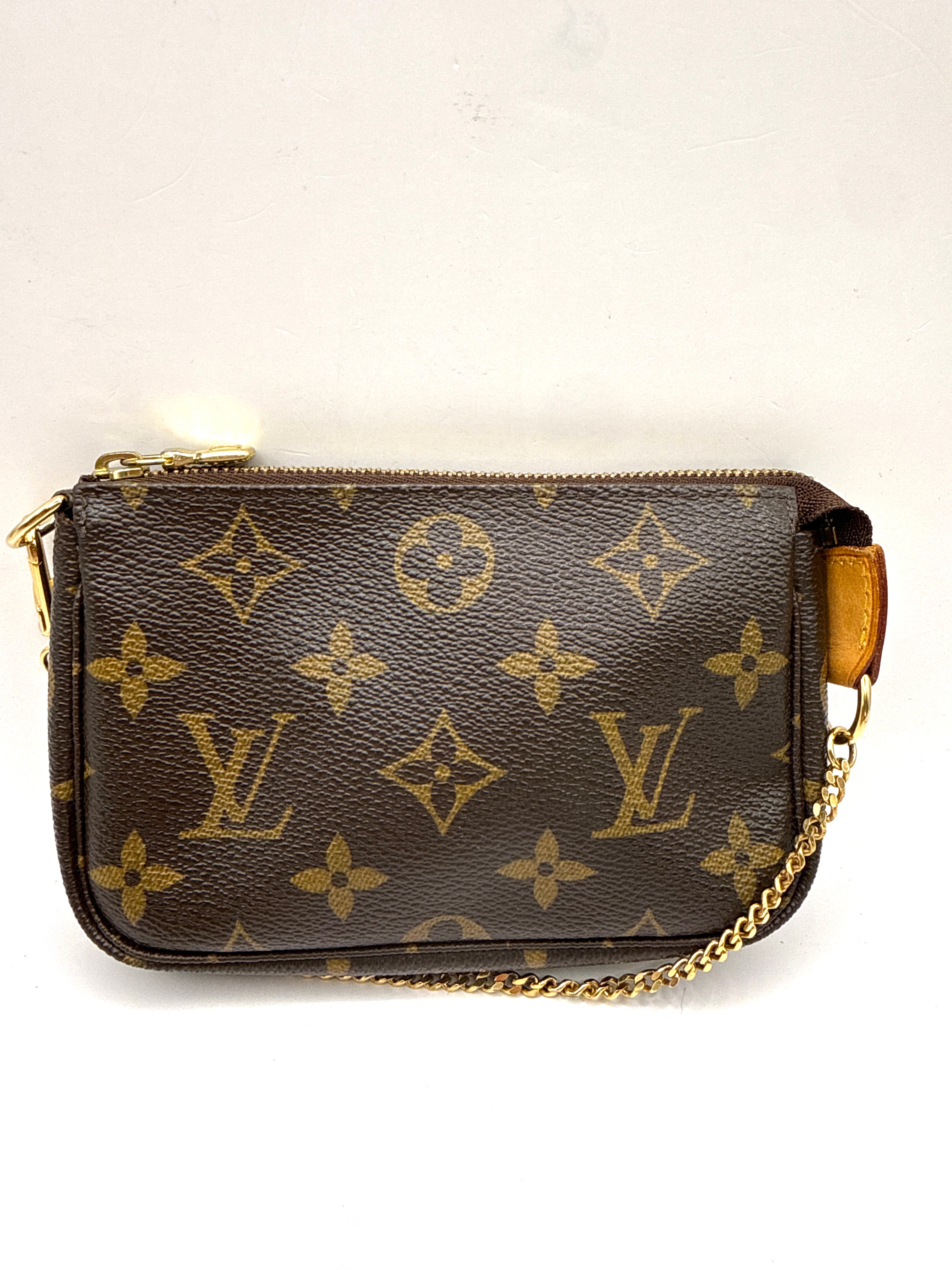 Louis Vuitton - Mini Pochette accessoires Monogram
