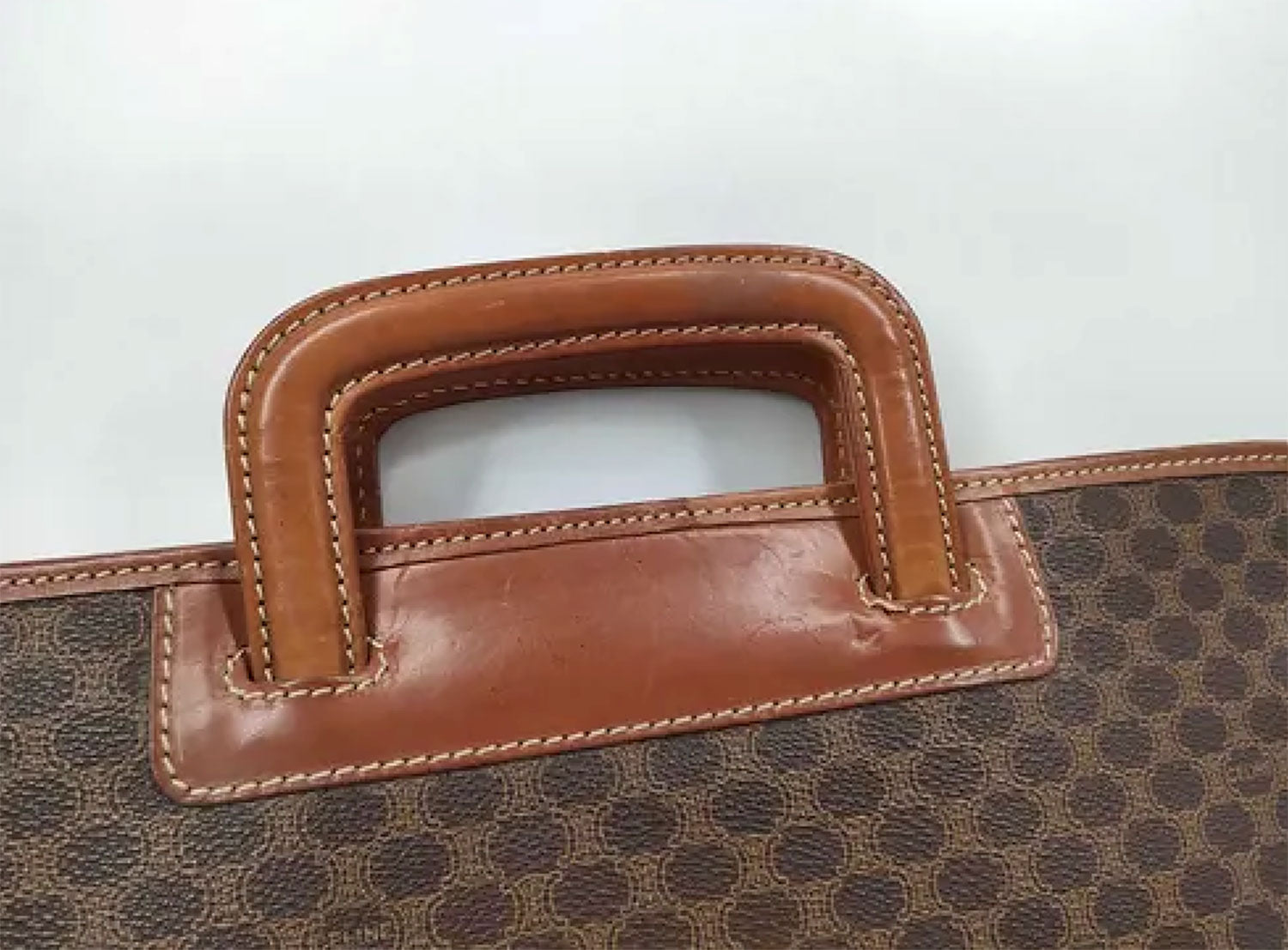 Sacoche porte-documents macadam vintage Céline, design en toile enduite avec finitions cuir.