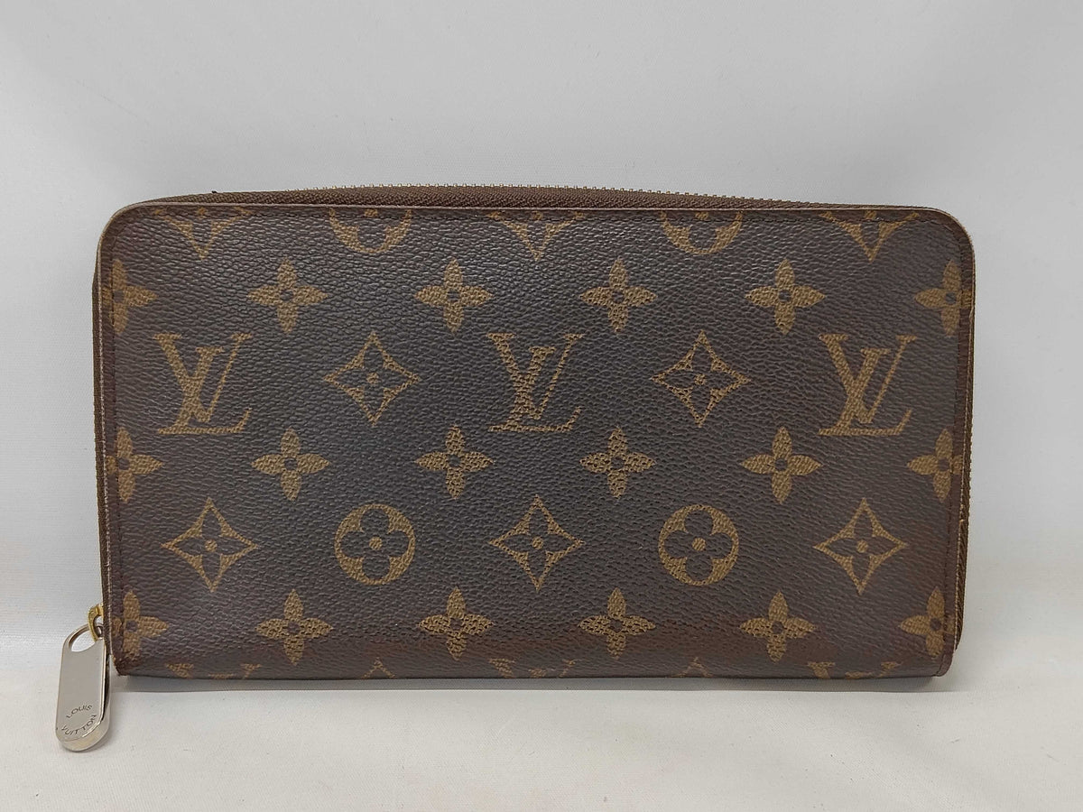 LV ORGANIZER ZIPPY MONO reservé julie