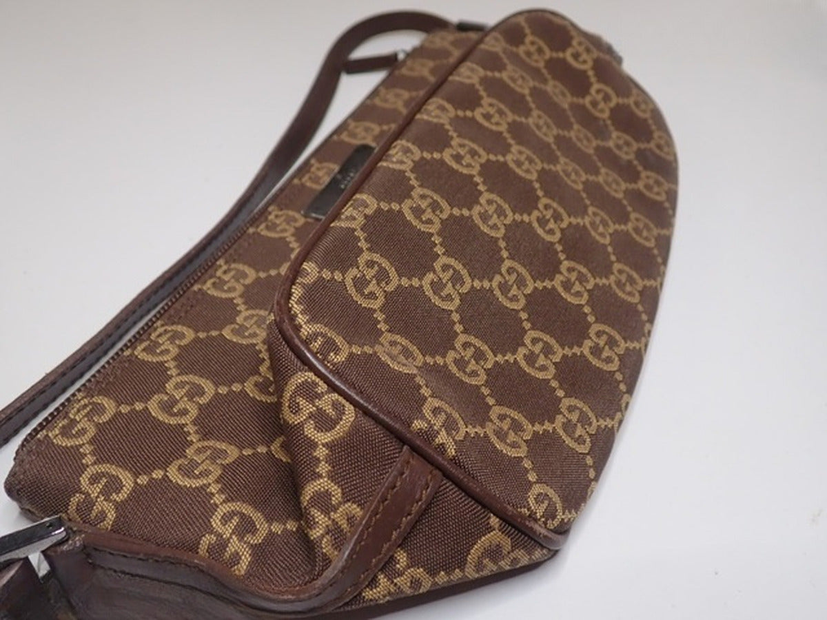 Gucci – Pochette Boat en toile GG marron
