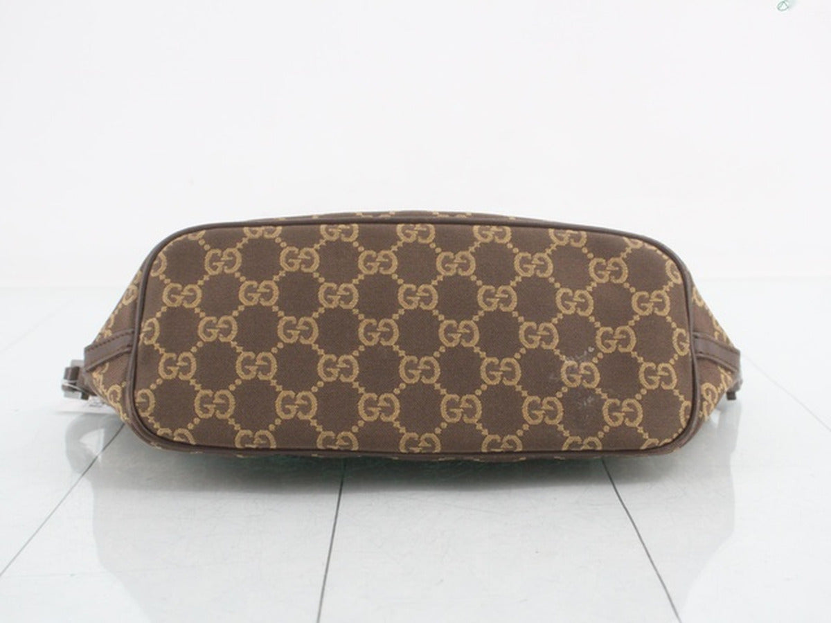 Gucci – Pochette Boat en toile GG marron