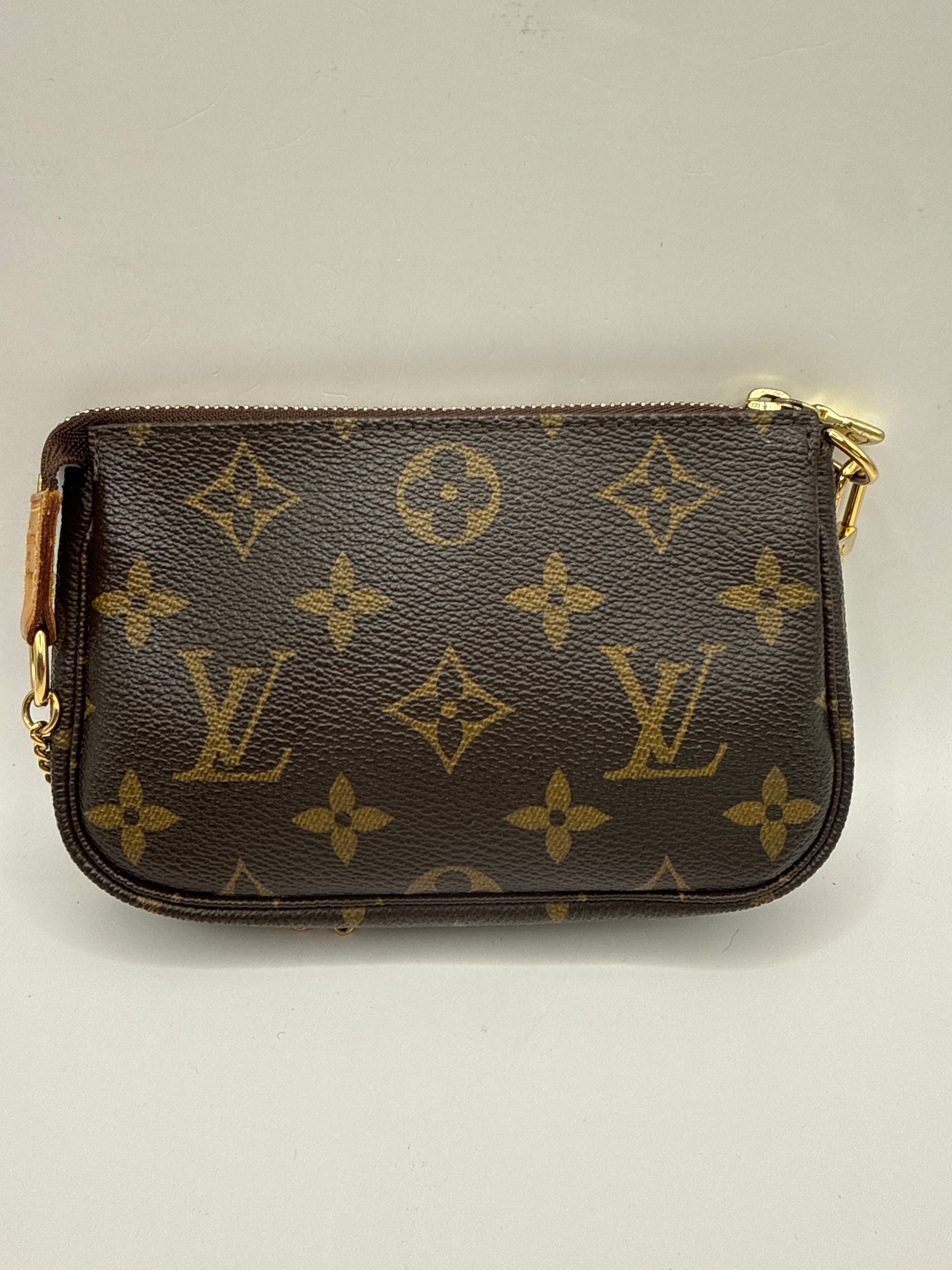 Louis Vuitton - Mini Pochette accessoires Monogram