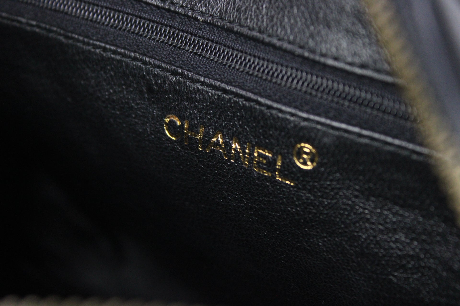 CHANEL Camera Chevrons Pompon Lambskin