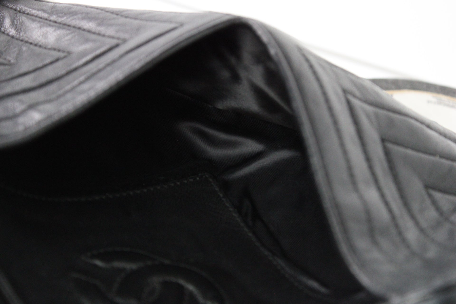 CHANEL Camera Chevrons Pompon Lambskin