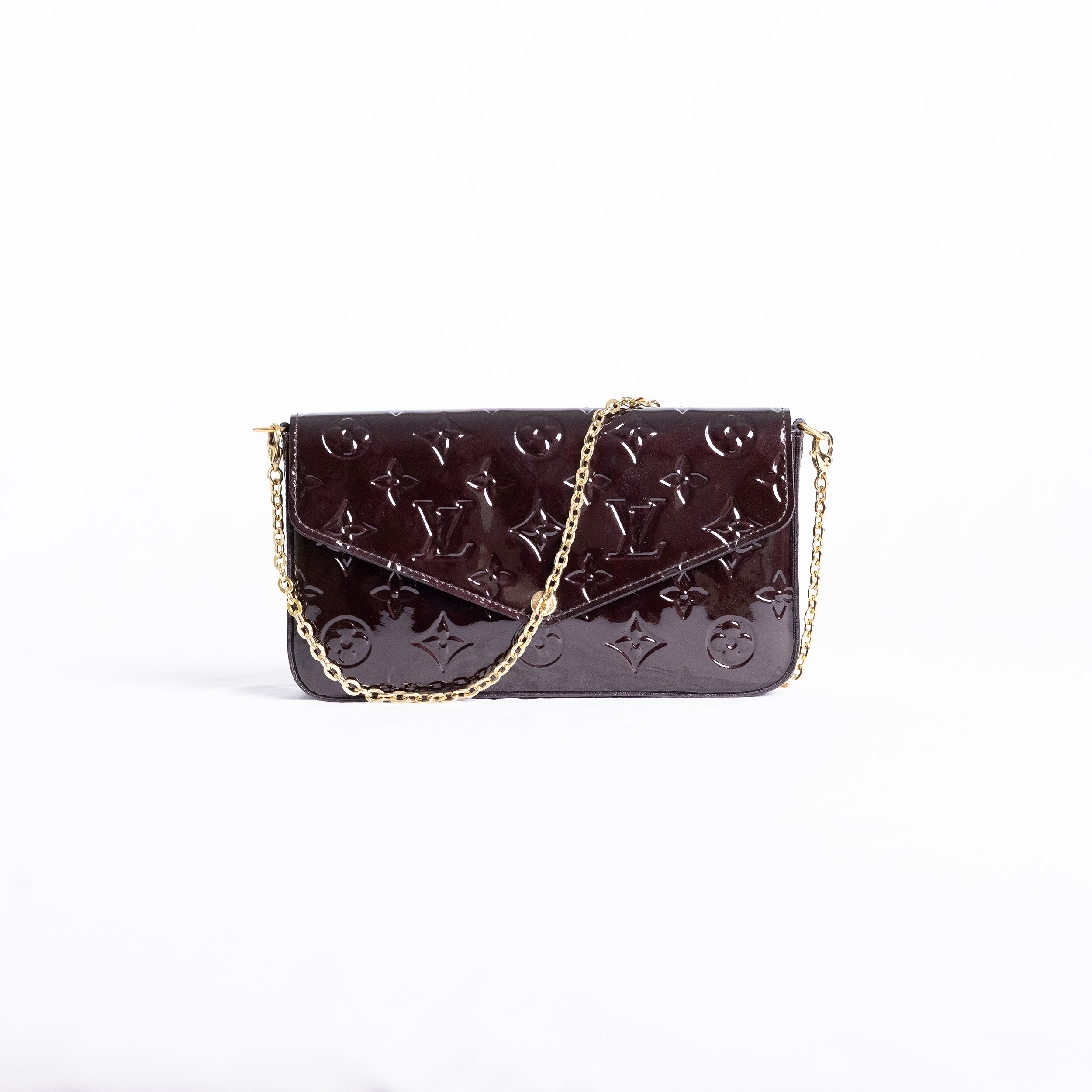 Louis Vuitton - Felicie en cuir vernis Amarante