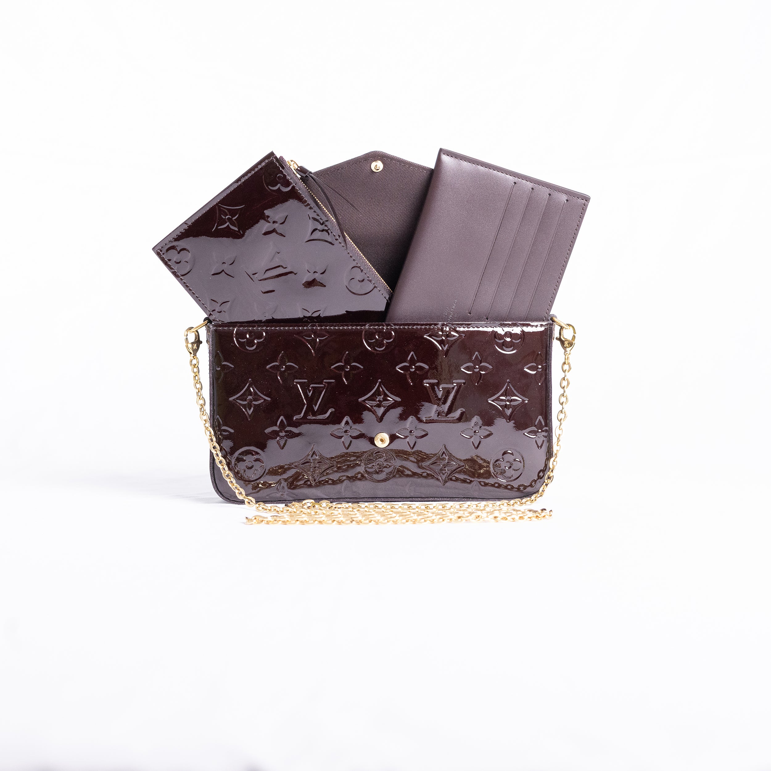 Louis Vuitton - Felicie en cuir vernis Amarante